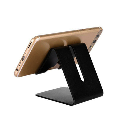 Metal phone holder for desk use.