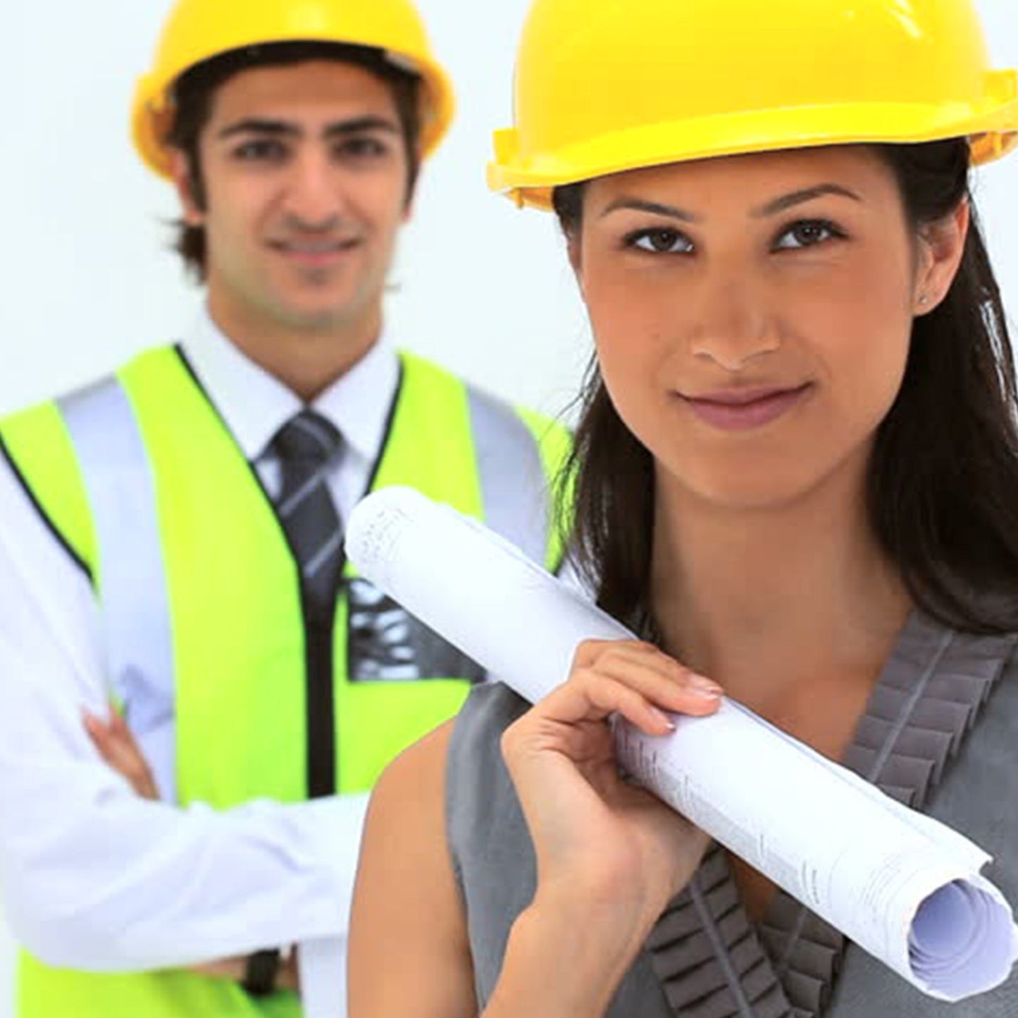 Yellow hard hat made of robust plastic, suitable for construction environments.