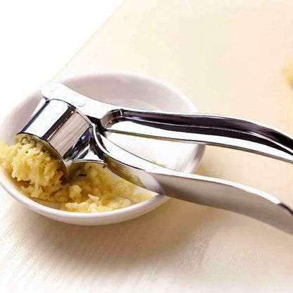 Garlic crusher and masher tool